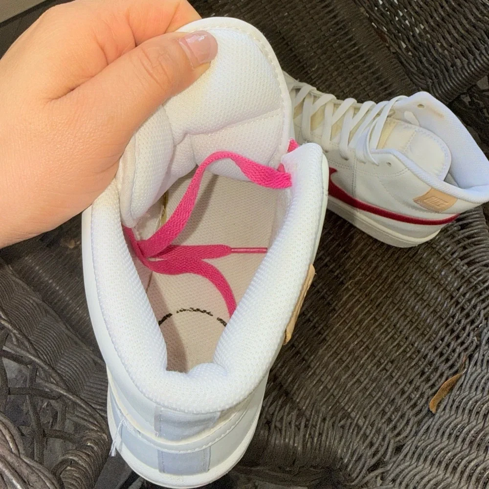Nike Women's Court Royale 2 Mid sneakers in white with a fuchsia-colored swoosh